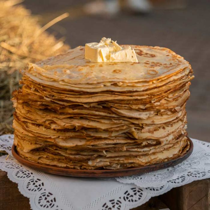 Poêle crêpe en fonte Pg hêtre + Spatule inox coudée
