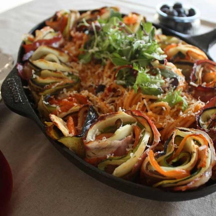 Poêle de cuisine en fonte spéciale poisson + manchon cuir