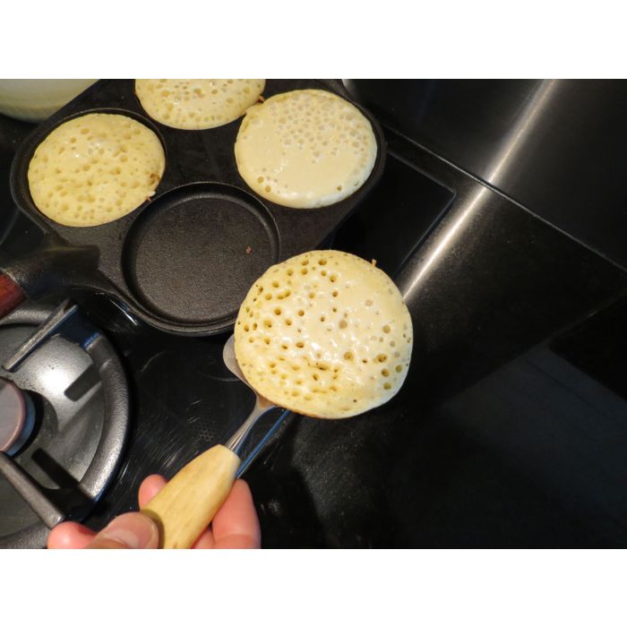 Poêle blinis en fonte 4 moules - Poignée fonte + manchon cuir