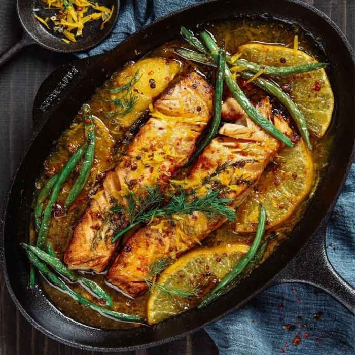 Poêle de cuisine en fonte spéciale poisson + manchon cuir