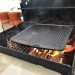 Plancha grille en fonte sur barbecue